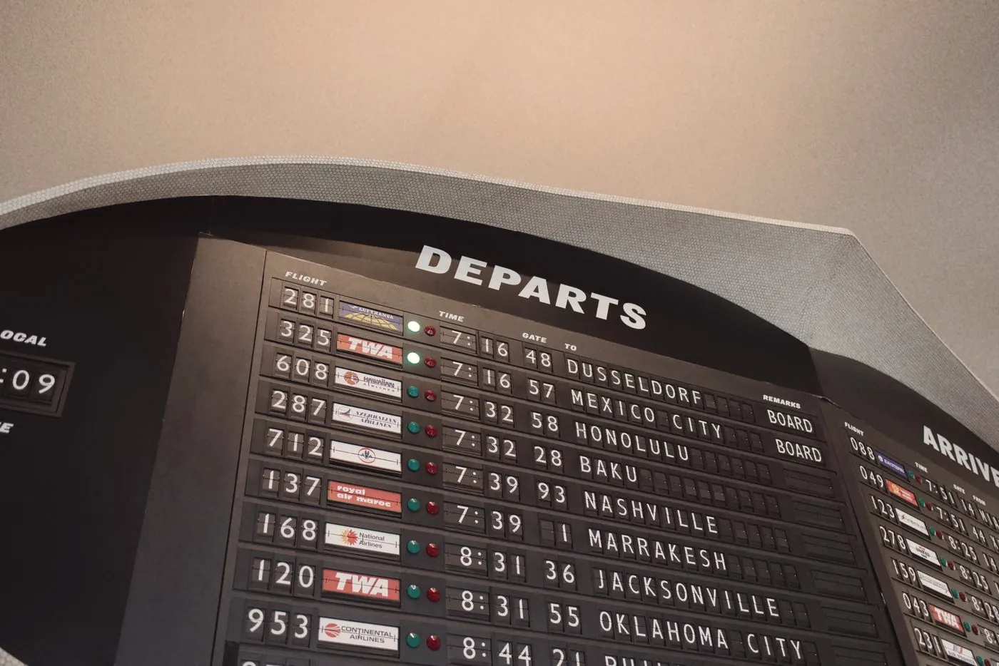 An airport departures board listing flight times, a reminder to start PEP before flying