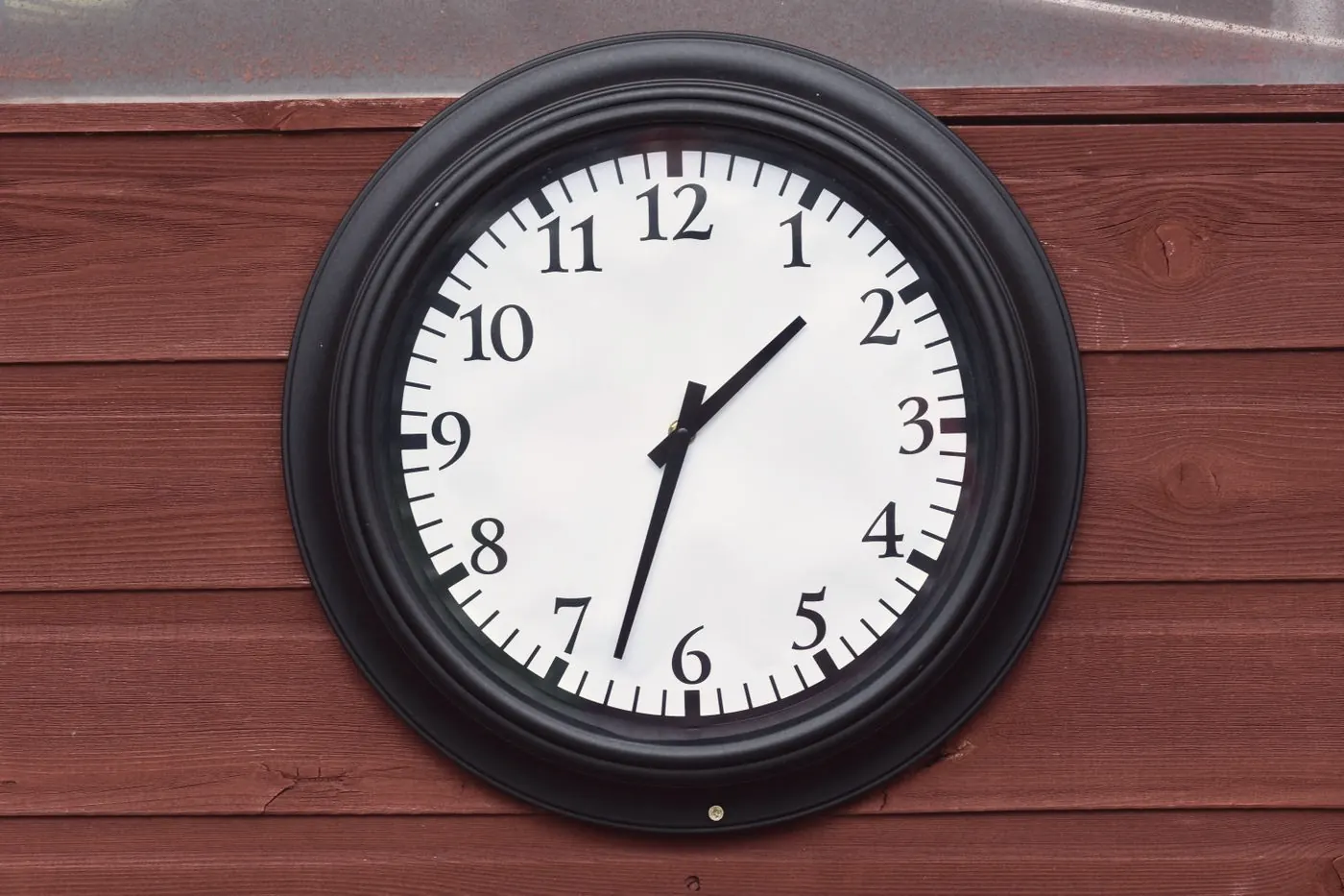 A black wall clock, a reminder that PEP must start within 72 hours