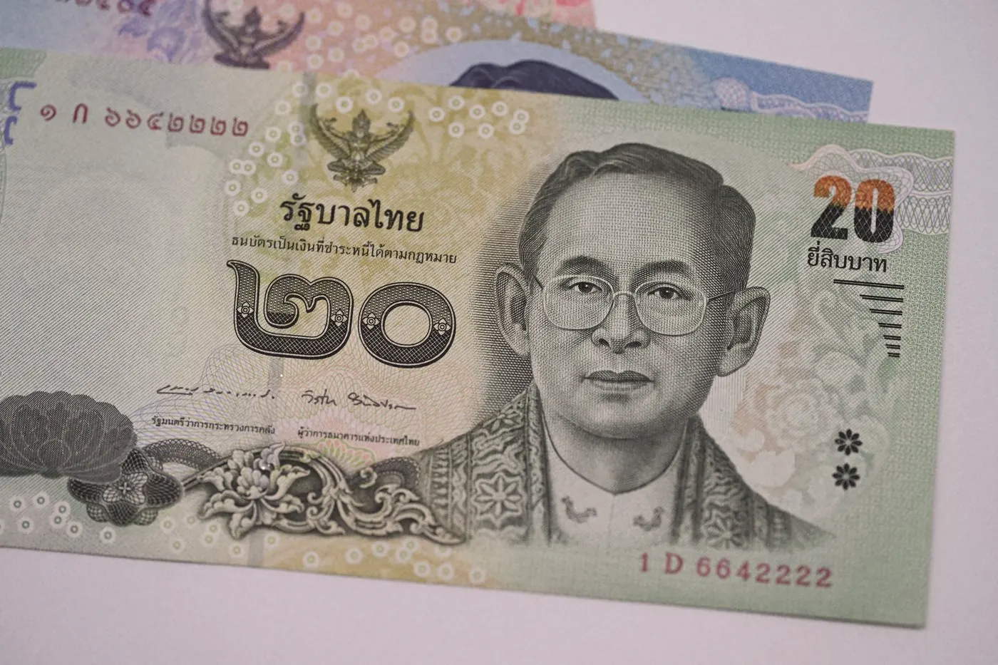 Close-up of a Thai baht banknote, the currency PEP prices are quoted in