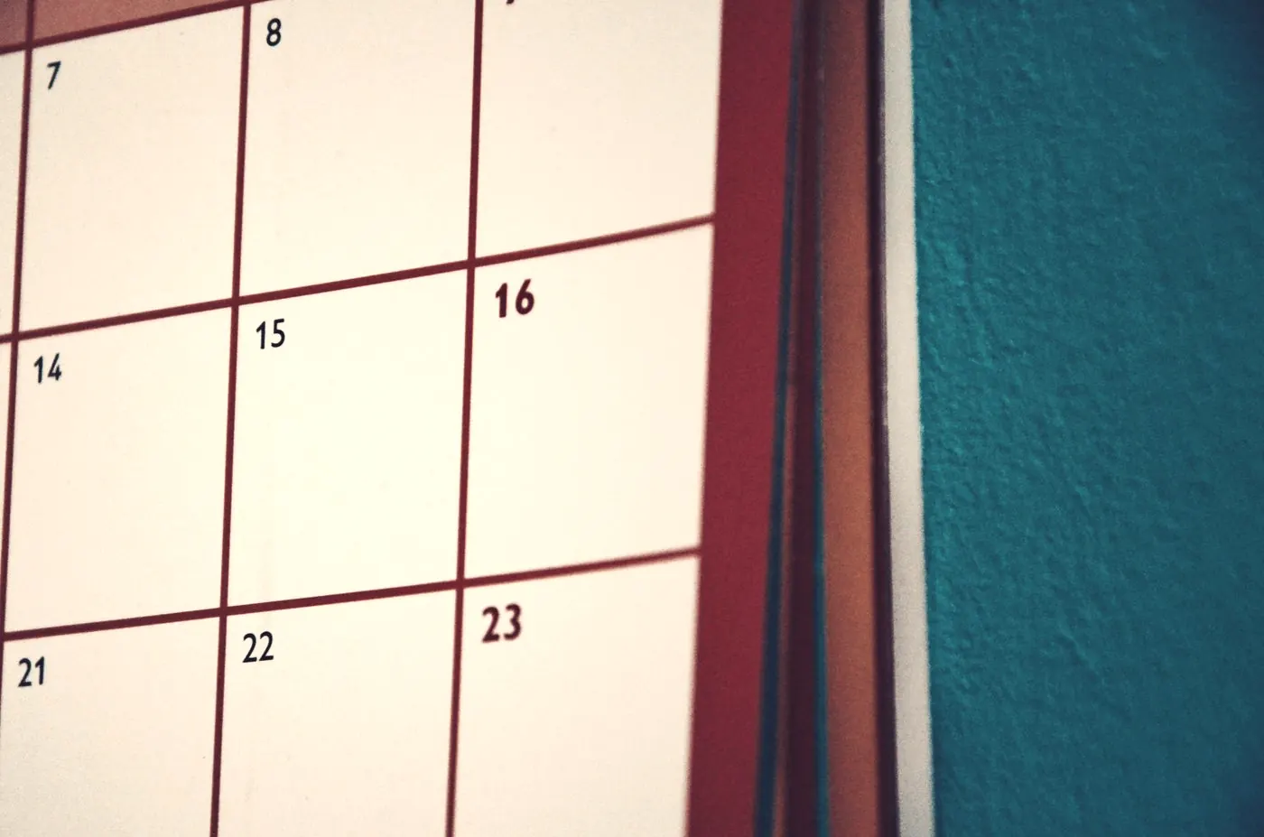 A plain wall calendar with dates in a grid, for counting the weeks since an exposure